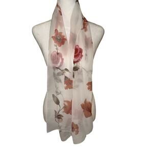 Berkshire white scarf features a delicate red and pink floral print, 60” L X 15”